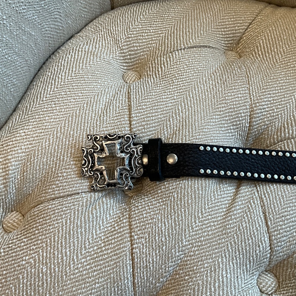 Leather belt. Black leather w/silver studs. Size 32. Silver cross buckle